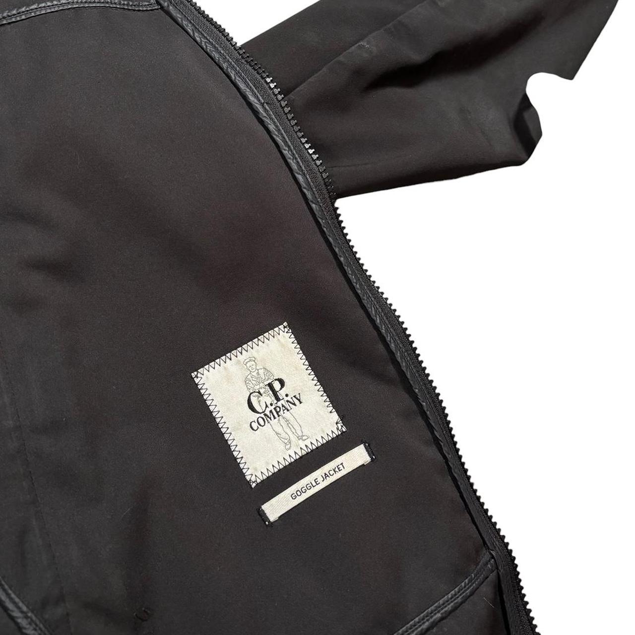 CP Company black soft shell goggle jacket (M)