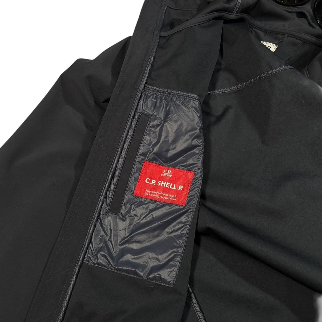 CP Company navy soft shell goggle jacket (L)