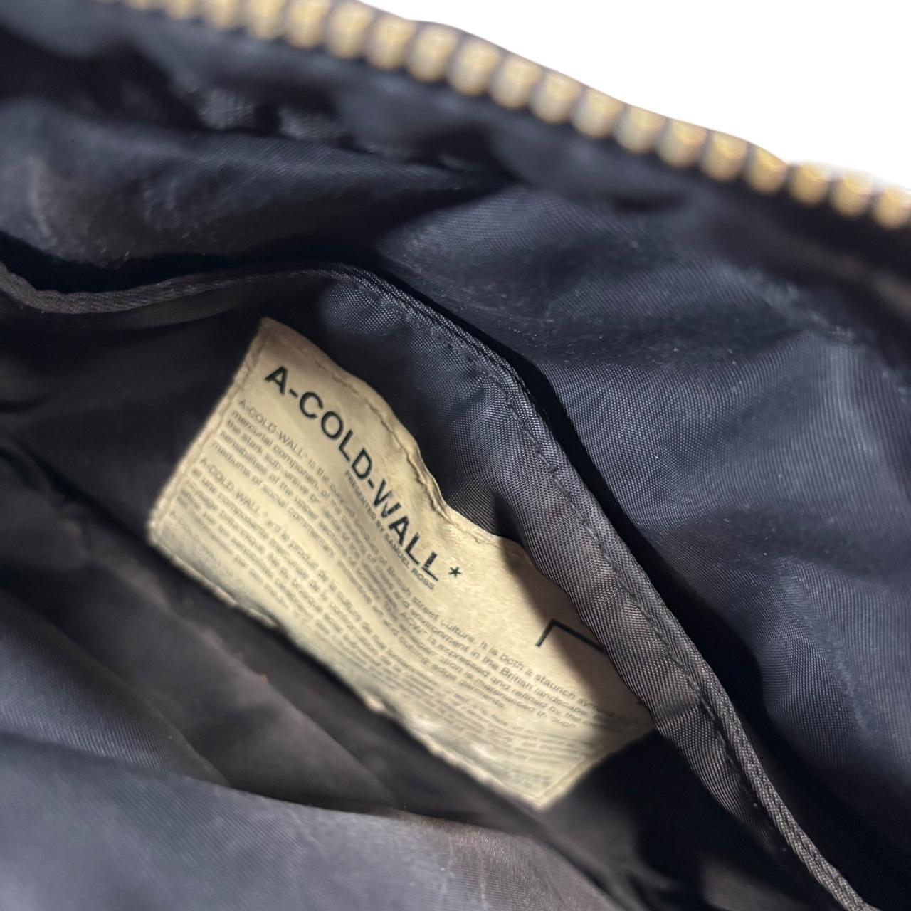 A cold wall black envelope crossbody side bag