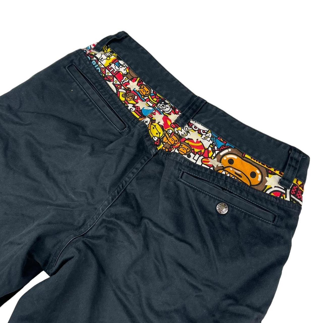 Bape baby milo sad face navy shorts (S)