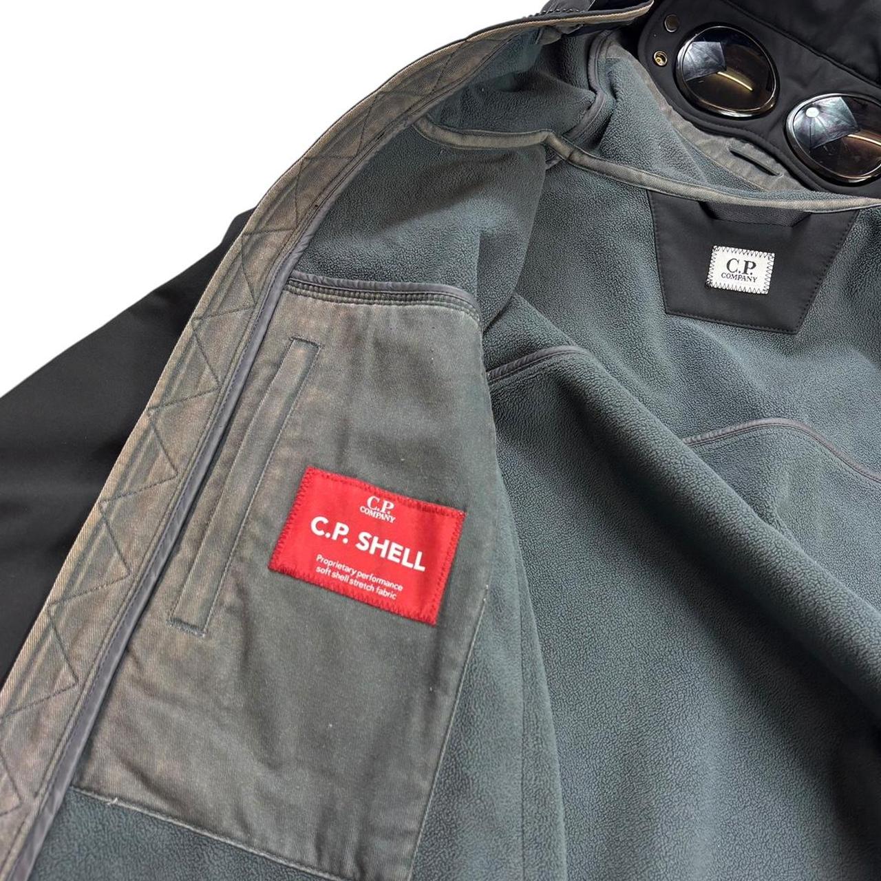 CP company black soft shell goggle jacket (XL)