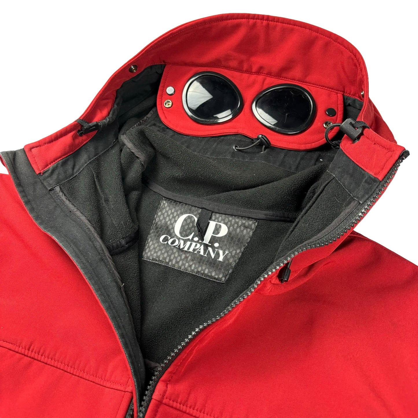 CP company red soft shell goggle jacket