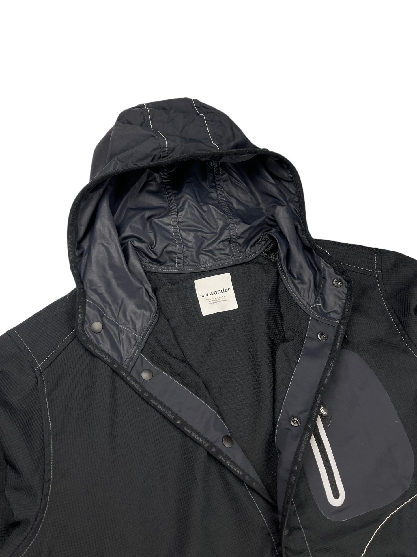 And Wander lightweight vent shell jacket