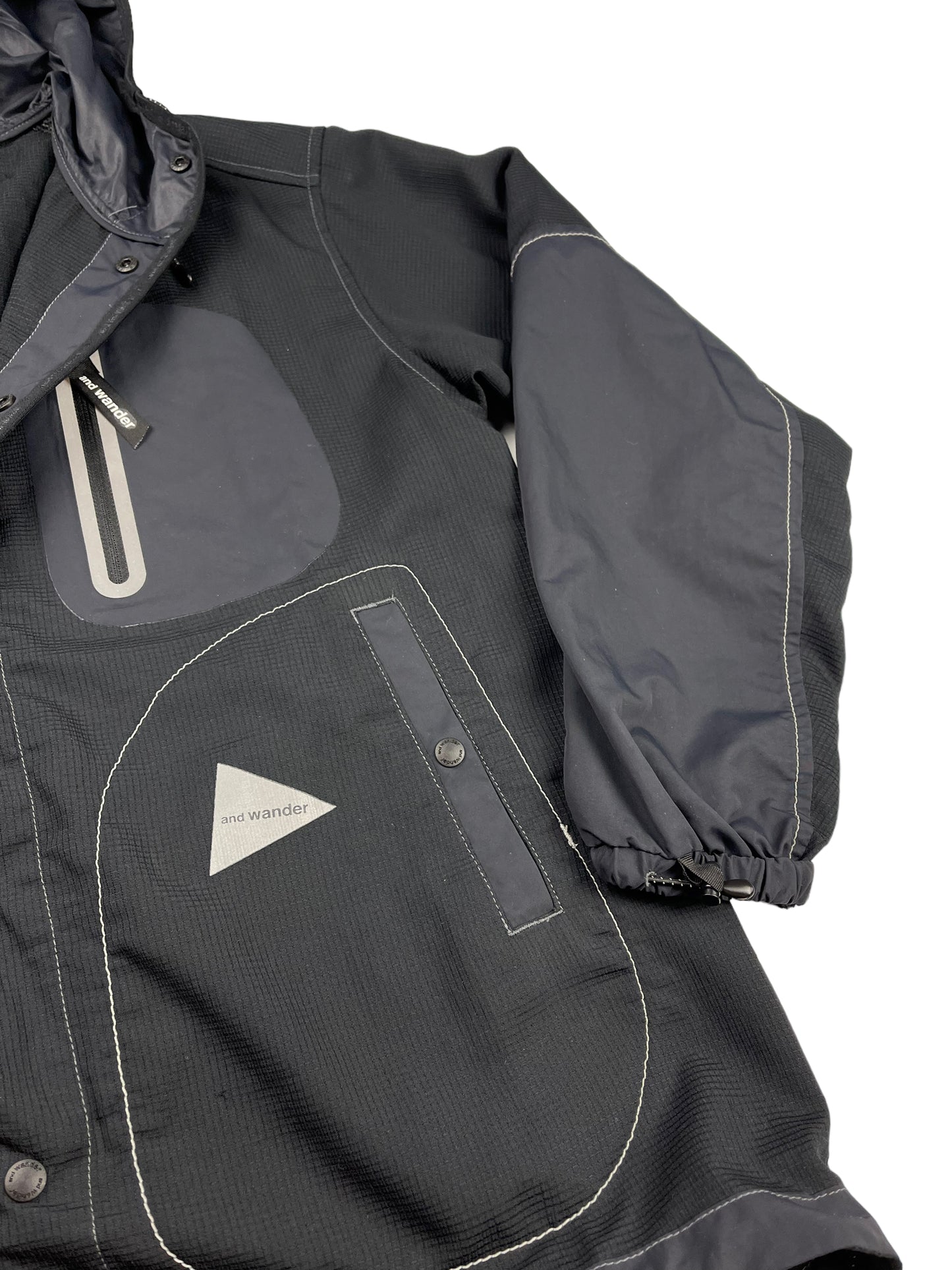 And Wander lightweight vent shell jacket