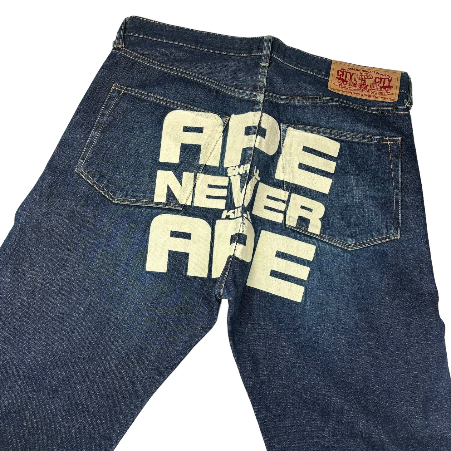 Bape ‘Ape shall never kill ape’ spellout denim jeans