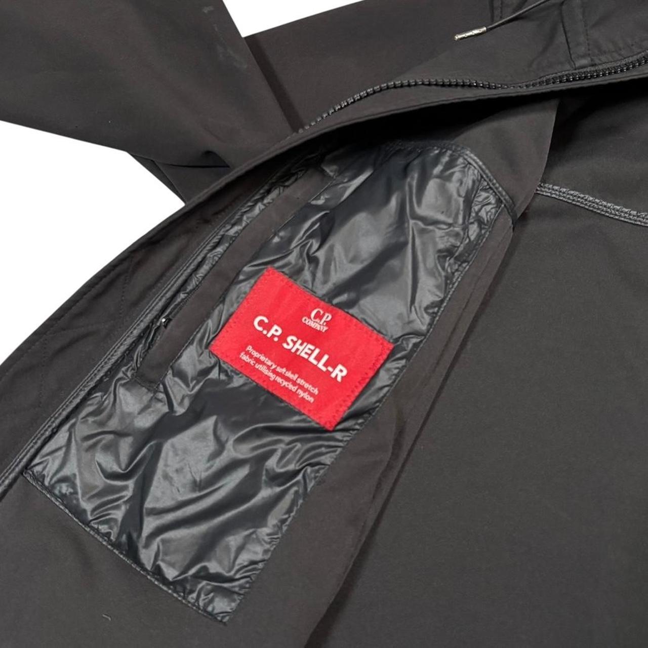 CP Company black soft shell goggle jacket (M)