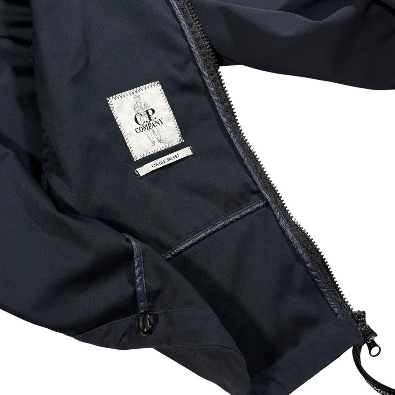CP Company navy soft shell goggle jacket (L)