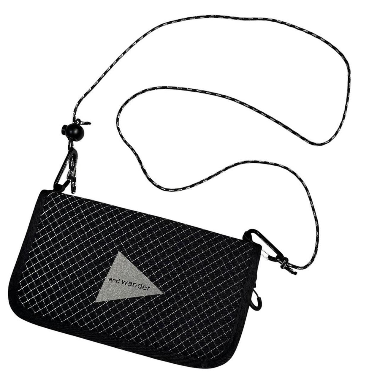 And wander reflective rip stop pouch crossbody side bag