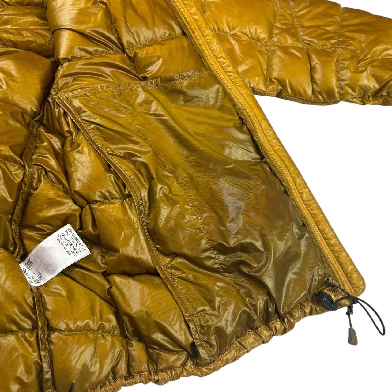 Montbell superior square stitch down puffer jacket (S)