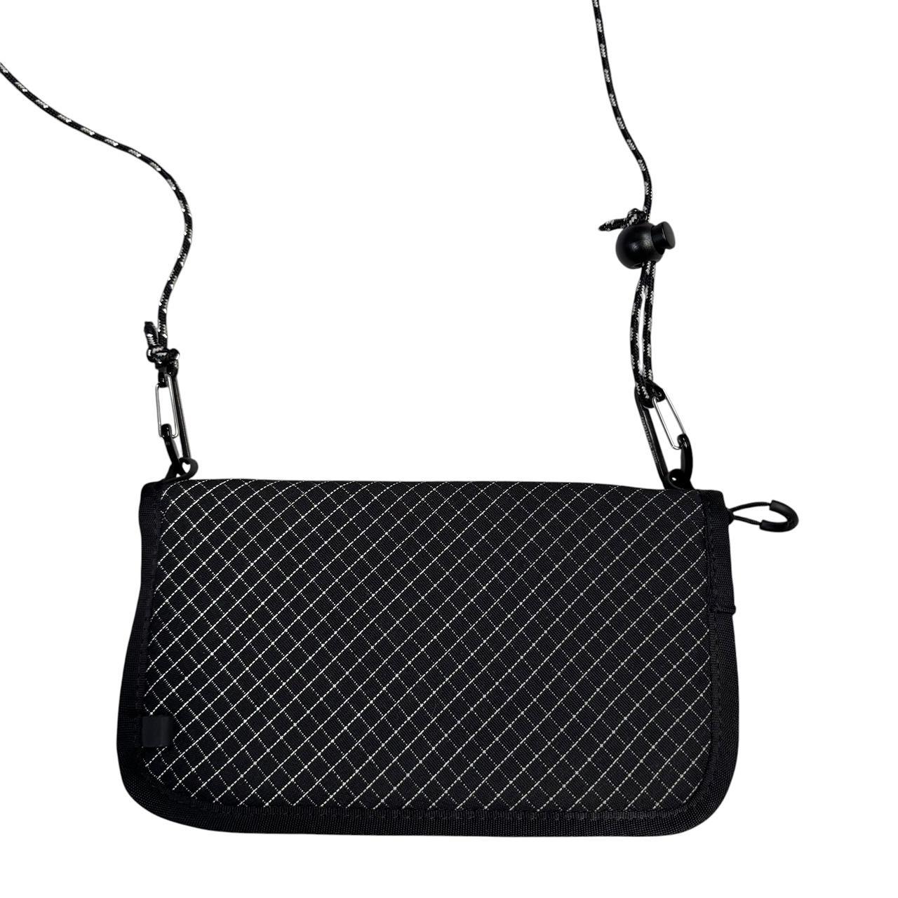 And wander reflective rip stop pouch crossbody side bag