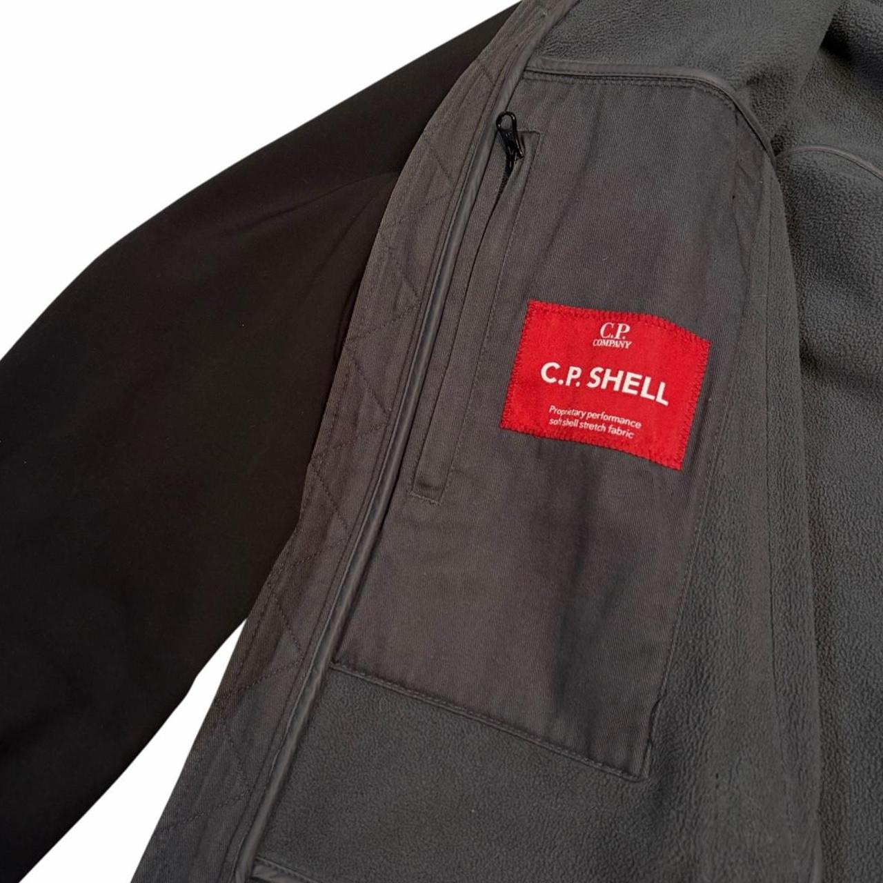 CP Company black soft shell goggle jacket (S)